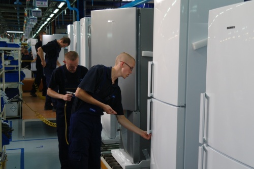 Employees work at Samsung Electronics' plant in Wronki, Poland.