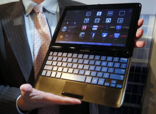 A Samsung 7 Series sliding PC at a Consumer Electronics Show preview in Las Vegas on Wednesday. The tablet computer features a sliding keyboard. (AP-Yonhap News)