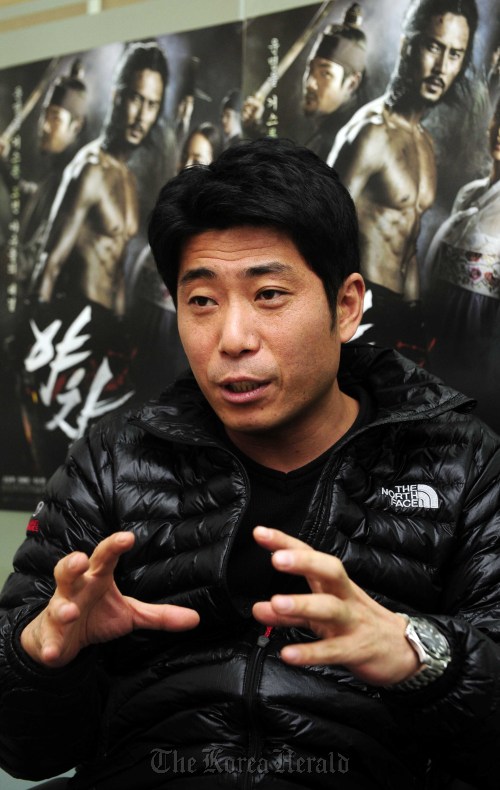 “Yaksa” director Kim Hong-sun discusses why he cut out certain sex scenes and how he worried over how to get the blood to look pretty in an interview with The Korea Herald. (Park Hae-mook/The Korea Herald)