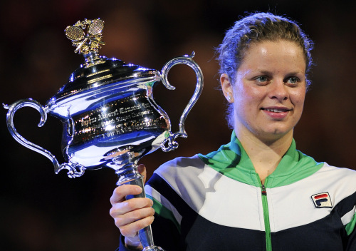 Kim Clijsters poses with the Australian Open championship trophy. (AP-Yonhap News)