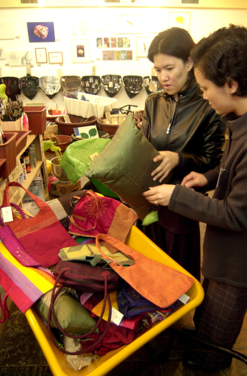 Visitors take a look at goods at a Beautiful Store shop in Seoul. (Korea Herald file photo)