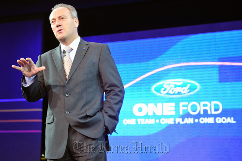 Stephen Odell, chief executive officer of Ford Europe, gestures while speaking prior to the start of the Paris Motor Show in Paris. (Bloomberg)