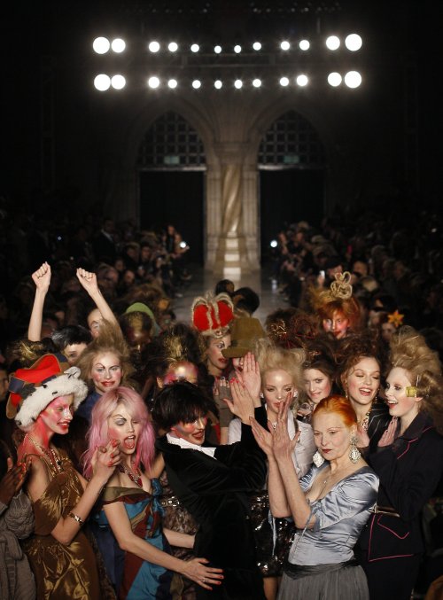 Vivienne Westwood (bottom right) applauds her models after her show for her Red Label collection, at London Fashion Week in London on Sunday. (AP-Yonhap News)