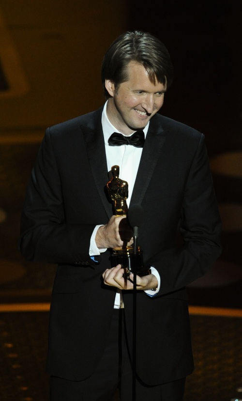 Tom Hooper accepts the Oscar for best achievement in directing for 