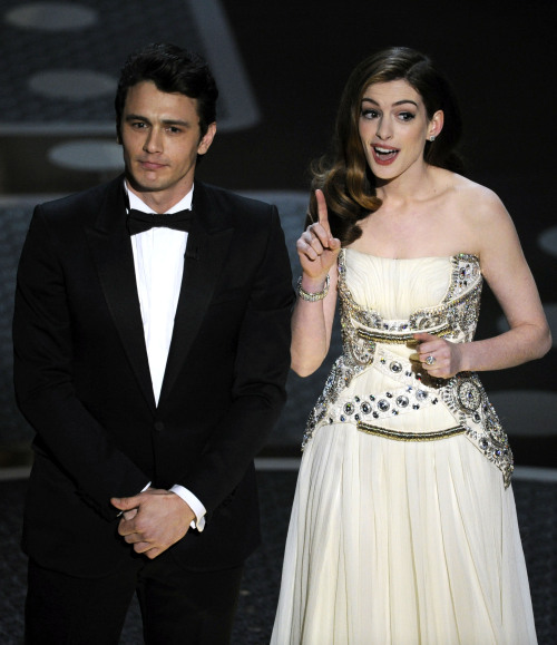 Hosts James Franco, left, and Anne Hathaway are seen onstage during the 83rd Academy Awards on Sunday. (AP-Yonhap News)