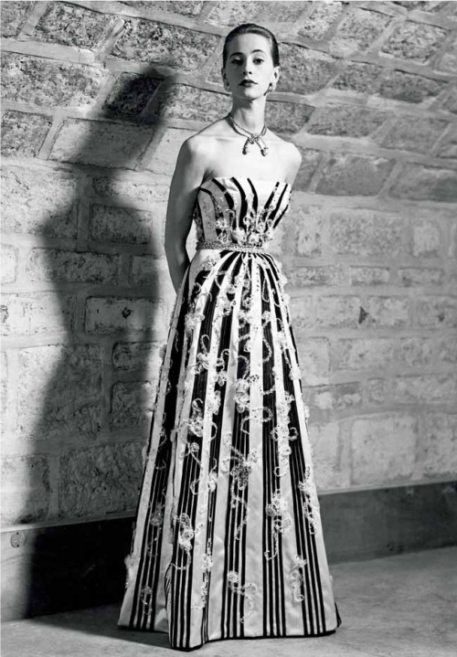 A black and white strapless gown by Balenciaga, 1946 appears in “Couture in the 21st Century” edited by Deborah Bee.   (MCT)
