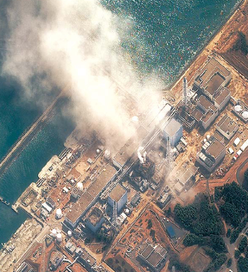 This satellite image provided by DigitalGlobe shows the damaged Fukushima Daiichi nuclear facility in Japan on Monday. (AP-Yonhap News)