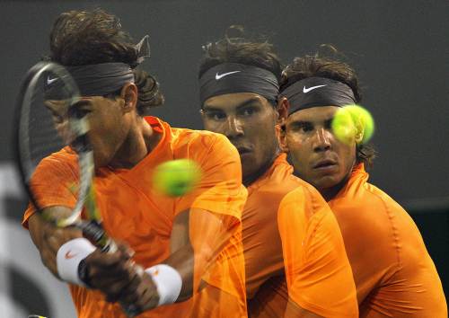 Rafael Nadal returns a shot against Somdev Devvarman. (AFP-Yonhap News)