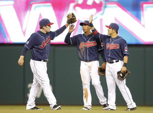Left to right: Austin Kearns, Michael Brantley and Choo Shin-soo of the Cleveland Indians celebrate a 3-1 win over the Boston Red Sox at Progressive Field in Cleveland, Ohio, Tuesday. (AFP-Yonhap News)