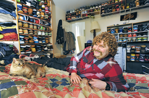 Whitney Morris, 28, keeps his collection of nearly 165 Nike shoes in his bedroom in Baltimore, Maryland. (Baltimore Sun/MCT)