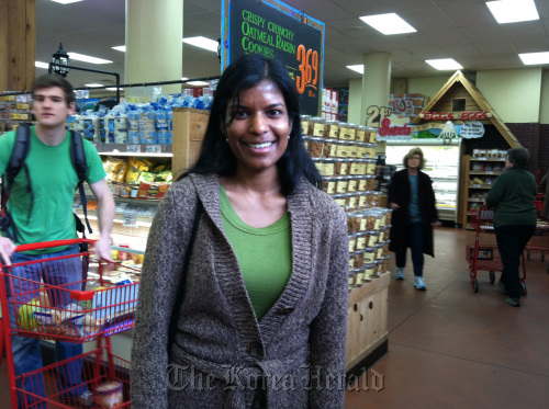 Surekha Sidney, a 27-year-old actuary, shops at Trader Joe’s at Center City in Philadelphia, Pennsylvania. Sydney said she receives one voicemail for every 10 to 15 texts. (Philadelphia Inquirer/MCT)