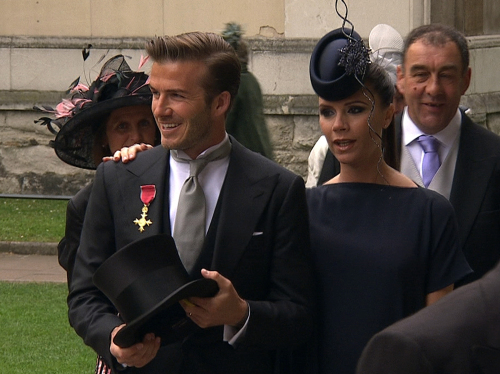 England's soccer star David Beckham, left and his wife Victoria