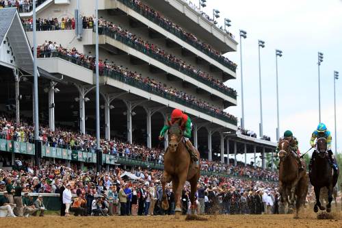Animal Kingdom crosses the finish line to win the 137th Kentucky Derby. (AFP-Yonhap News)