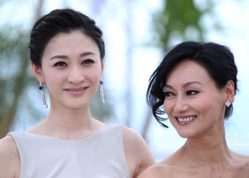 Actresses Li Xiaoran (L) and Kara Hui pose during the photocall of 