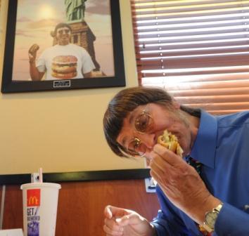 Don Gorske, 59, a retired prison guard, eats his 25,000th Big Mac on Tuesday, May, 17, 2011 at a McDonalds in his hometown of Fond du La, Wis. Guinness World Records recognized Gorske's feat three years and 2,000 Big Macs ago, but Gorske says he has no desire to stop. (AP)