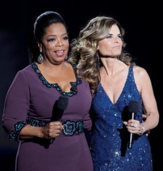 Maria Shriver appears with Oprah Winfrey during a star-studded double-taping of 