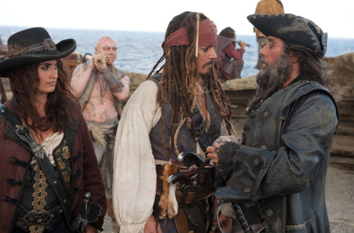 Johnny Depp (center), Penelope Cruz and Ian McShane are shown in a scene from “Pirates of the Caribbean: On Stranger Tides,” from Disney. (MCT)