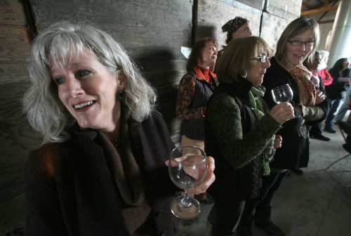 Kimberly Dougherty enjoys sampling a wine during a tour at Marian Farms in Fresno, California. (MCT)