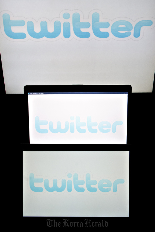Twitter Inc. logos are displayed on computer screens. (Bloomberg)