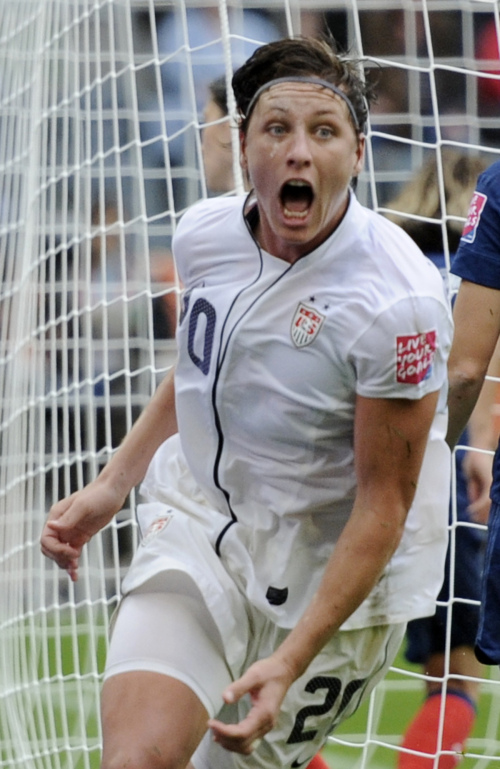 Abby Wambach of the U.S. celebrates her goal against France. (AP-Yonhap News)