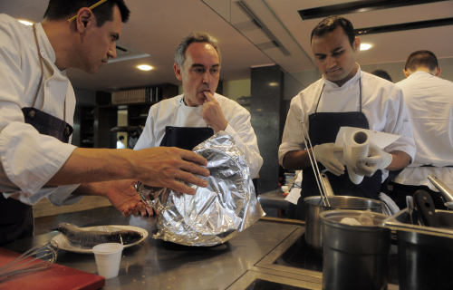 This March 30, 2011 file photo shows Spanish chef Ferran Adria as he tastes some food in the kitchen of his restaurant elBulli in Roses, Spain. (AP-Yonhap News)