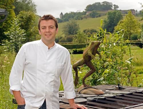 French chef of Michelin-starred restaurant La Grenouillere Alexandre Gauthier poses in the garden at the restaurant in La Madeleine-sous-Montreuil on July 27. (AFP-Yonhap News)