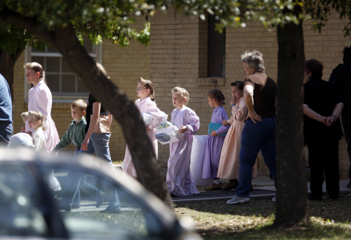 Women and children from the YFZ Ranch, the compound built by polygamist leader Warren Jeffs, are moved by bus to San Angelo, Texas, on April 6, 2008. (MCT)