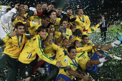 Brazil players celebrate with the trophy after the U-20 World Cup final soccer match with Portugal in Bogota, Colombia, Saturday, Aug. 20, 2011. Brazil defeated Portugal 3-2 on extra time and won the U-20 World Cup championship.(AP)