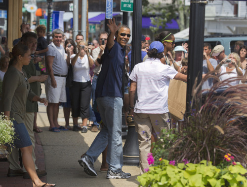 US President Barack Obama leaves a bookstore near his vacationing site. AP