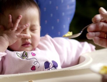 This picture shows a baby fed by her mother but is not relevant to the story. (MCT)