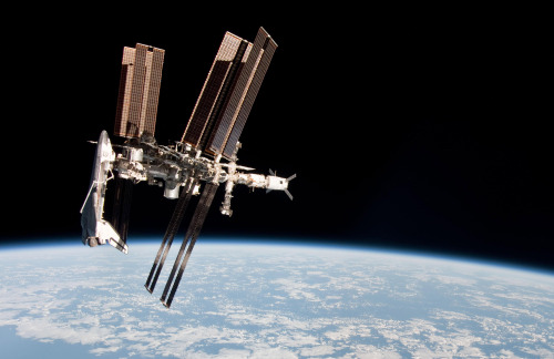 Space shuttle Endeavour is docked at the International Space Station on March 23. (AP-Yonhap News)