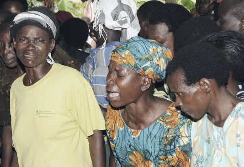 Relatives mourn for their loved ones who died in landslides in Gombe village in the Bulambuli district, 267 kilometers east of Kampala on Tuesday. (AP-Yonhap News)