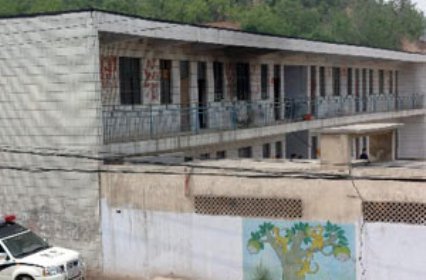 Photo taken on May 8, 2006 shows the venue of an arson attack in Shiguan Village in Gongyi City, central China's Henan Province. (Xinhua)