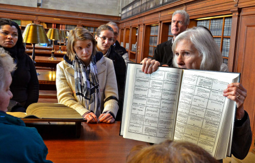 Docent Julie Chelminski shows what cards in the card catalog once looked like in the New York City Public Library’s Schwarzman Building. (Christopher Reynolds/Los Angeles Times/MCT)