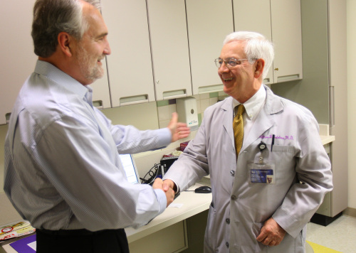 Dr. William Catalona, right, director of the prostate cancer program at Northwestern Memorial Hospital, speaks to patient Richard LaVerdiere. (MCT)