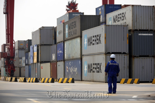 Containers are stacked at the Yangshan Deep Water Port in Shanghai. (Bloomberg)