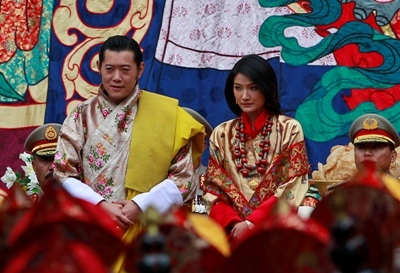 King Jigme Khesar Namgyal Wangchuck,left, and Queen Jetsun Pema sit during Buddhist blessings prior to their marriage at the Punakha Dzong, in Punakha, Bhutan, Thursday. AP)