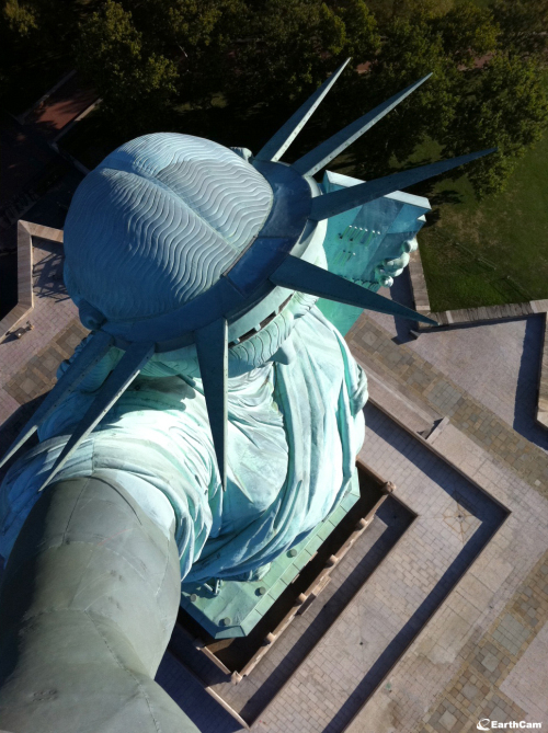 This undated photo provided by EarthCam, shows the Statue of Liberty in New York Harbor from a camera mounted in its torch, in New York. Five torch cams will be switched on Friday, Oct. 28, 2011, during a ceremony to commemorate the statue?s dedication. (AP)