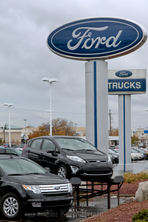 Ford Motor Co. vehicles sit on the lot at the Avis Ford dealership in Southfield, Michigan. (Bloomberg)