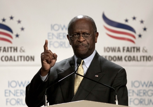 Republican presidential candidate businessman Herman Cain speaks at the Iowa Faith and Freedom Coalition presidential candidate forum, in Des Moines, Iowa, Saturday. (AP-Yonhap News)