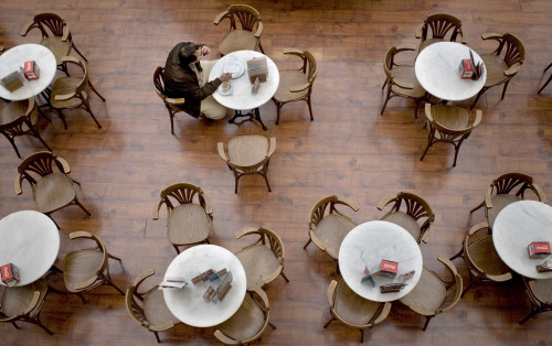 A man drinks coffee in an empty coffee bar, in Pamplona, northern Spain. (AP-Yonhap News)