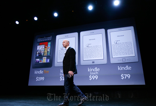 Jeff Bezos, chief executive officer of Amazon.com Inc., introduces the new Kindle Fire tablet computer at a news conference in New York. (Bloomberg)