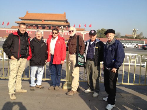 American volunteers (from left) Rob Beckham, Frank Purvis, Dave West, Earl Martin, Charlie Thell and Tim DuBois stand in front of Beijing’s Forbidden City while waiting in China for their visas to be approved before arriving in North Korea on Dec. 6. (FCH)