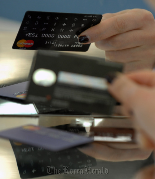 A Hyundai Card Co. credit card is displayed for a photograph at the company’s headquarters in Seoul. (Bloomberg)