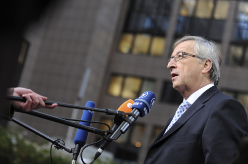 Luxembourg’s Prime Minister and head of the eurogroup Jean-Claude Juncker speaks with the media as he arrives for an EU summit in Brussels on Dec. 8. (AP-Yonhap News)