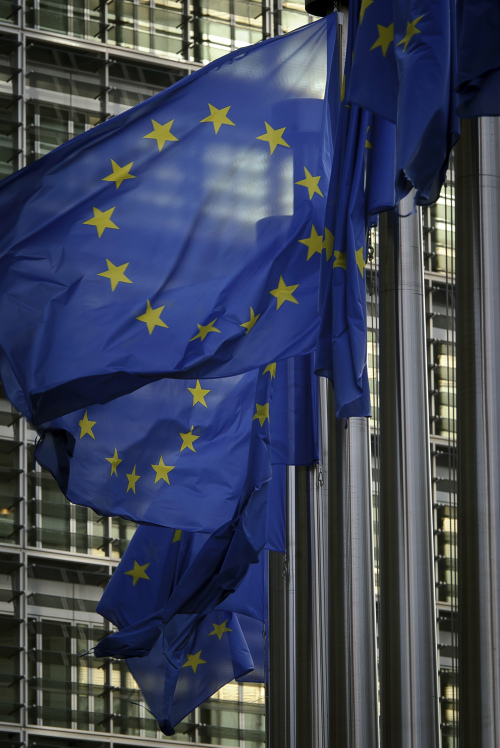 European Union flags fly outside the the European Commission headquarters in Brussels. (Bloomberg)