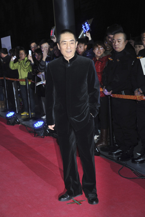 Chinese director Zhang Yimou poses at the issuing ceremony of the commemorative book of movie “The Flowers of War” in Beijing, on Dec. 12. (Xinhua-Yonhap News)