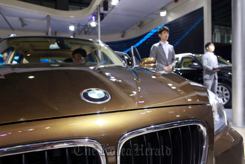 A Bayerische Motoren Werke AG vehicle stands on display during the media preview of the Guangzhou International Automobile Exhibition in Guangzhou, Guangdong Province, China. (Bloomberg)