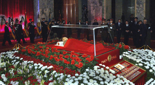 In this photo released by the Korean Central News Agency and distributed in Tokyo by the Korea News Service Tuesday, Dec. 20, 2011, the body of North Korean leader Kim Jong Il is laid in the Kumsusan Memorial Palace in Pyongyang, North Korea. Kim died on Saturday, Dec. 17, North Korean state media announced Monday. (AP-Yonhap News)