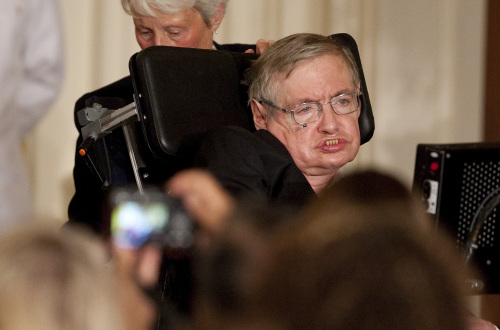 Stephen Hawking, professor of mathematics at Cambridge University, arrives at the 2009 Presidential Medal of Freedom ceremony in the East Room of the White House in Washington, D.C. (Bloomberg)